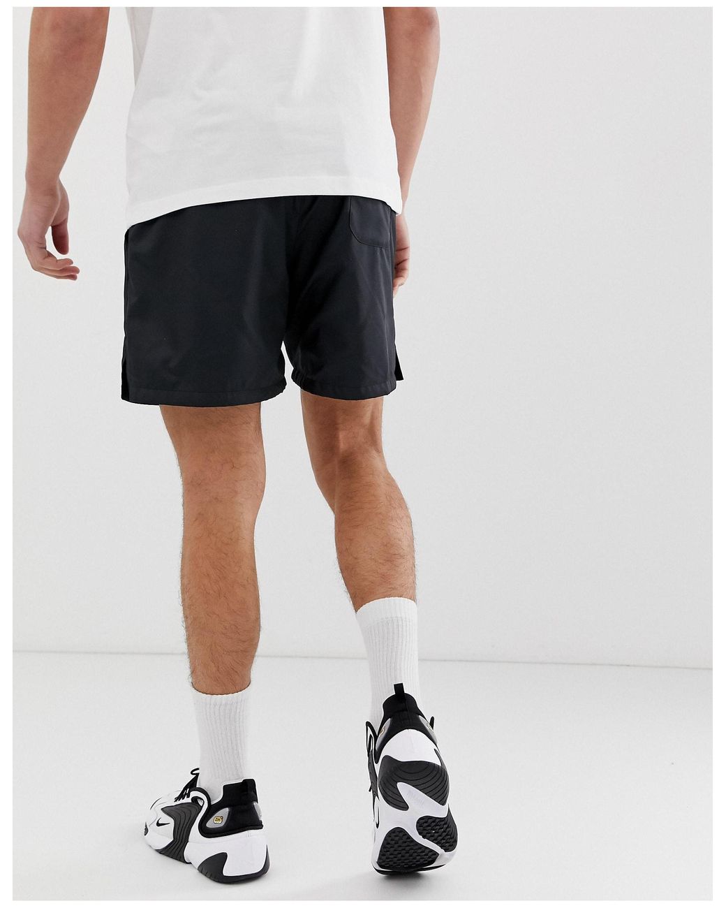 nike club essentials woven flow shorts yellow