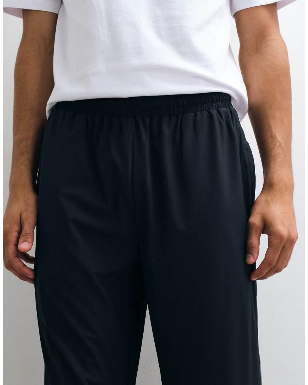 4505 White Woven Track joggers With Side Stripe And Zip Pockets for men