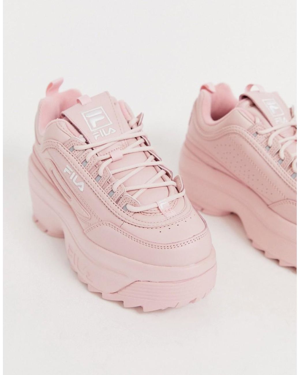 pink fila disruptor trainers cheap online