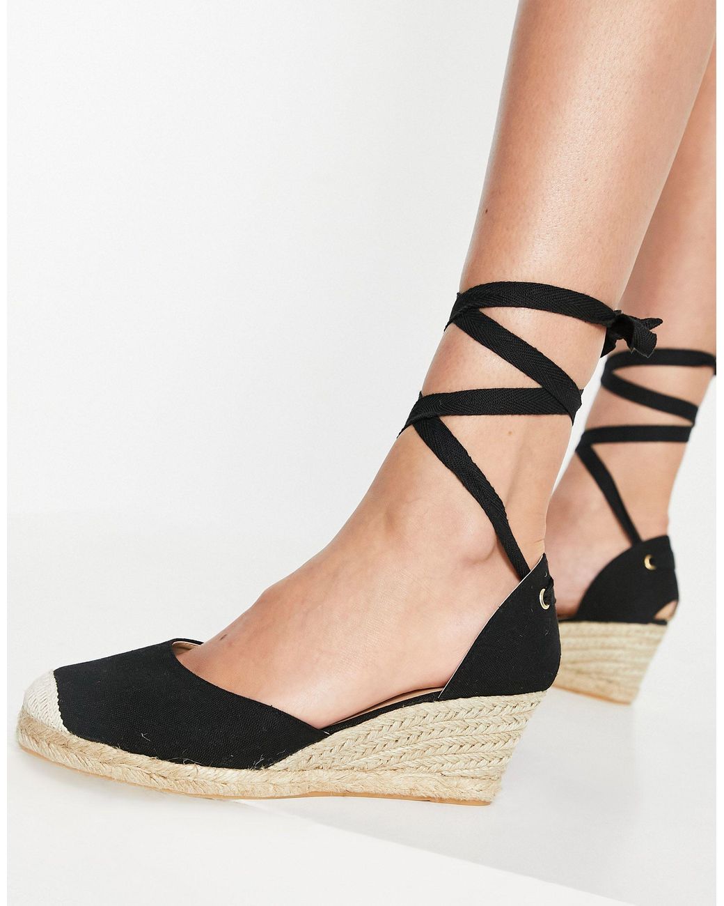 zeppe nere con lacci