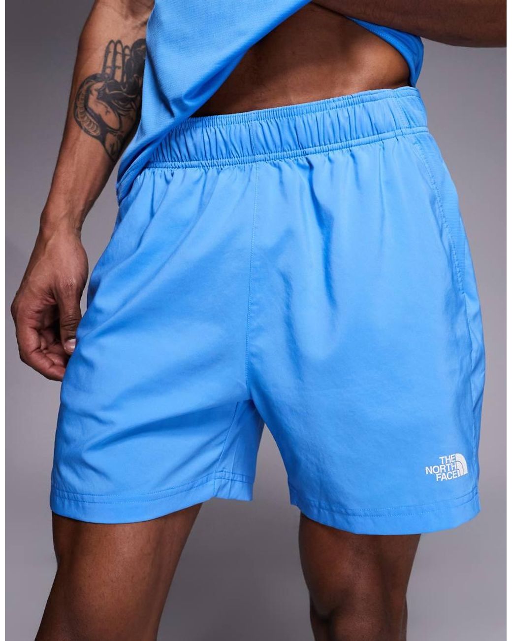 The North Face Blue 24/7 Logo 5" Shorts for men