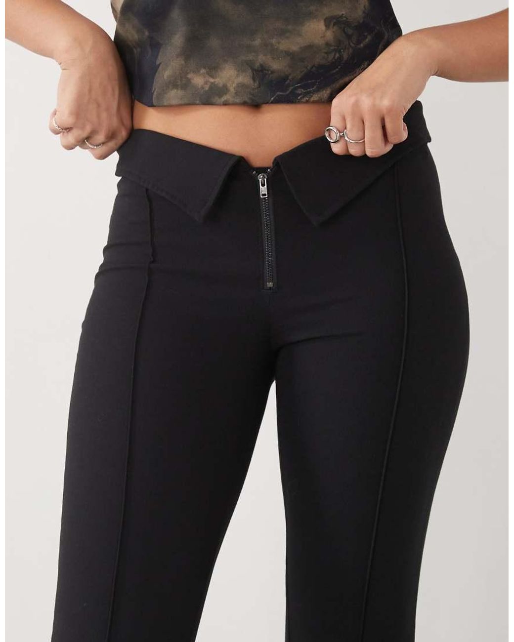 Monki Black Low Rise Flared Trousers With Fold Down Waist Detail