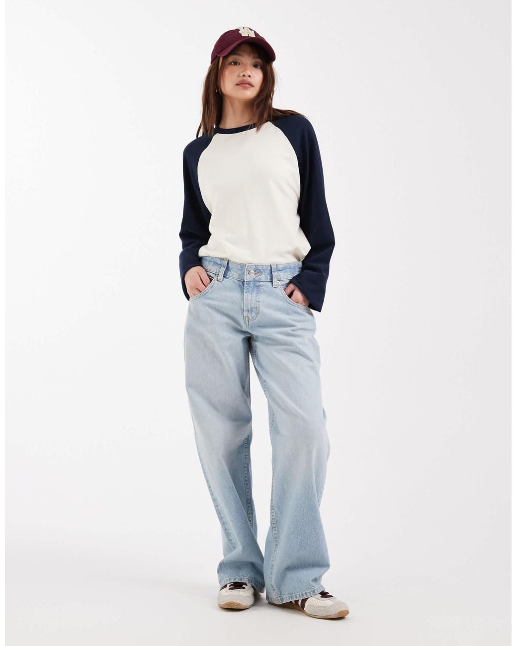 Baseball-style raglan T-shirt styled with light retro baggy denim