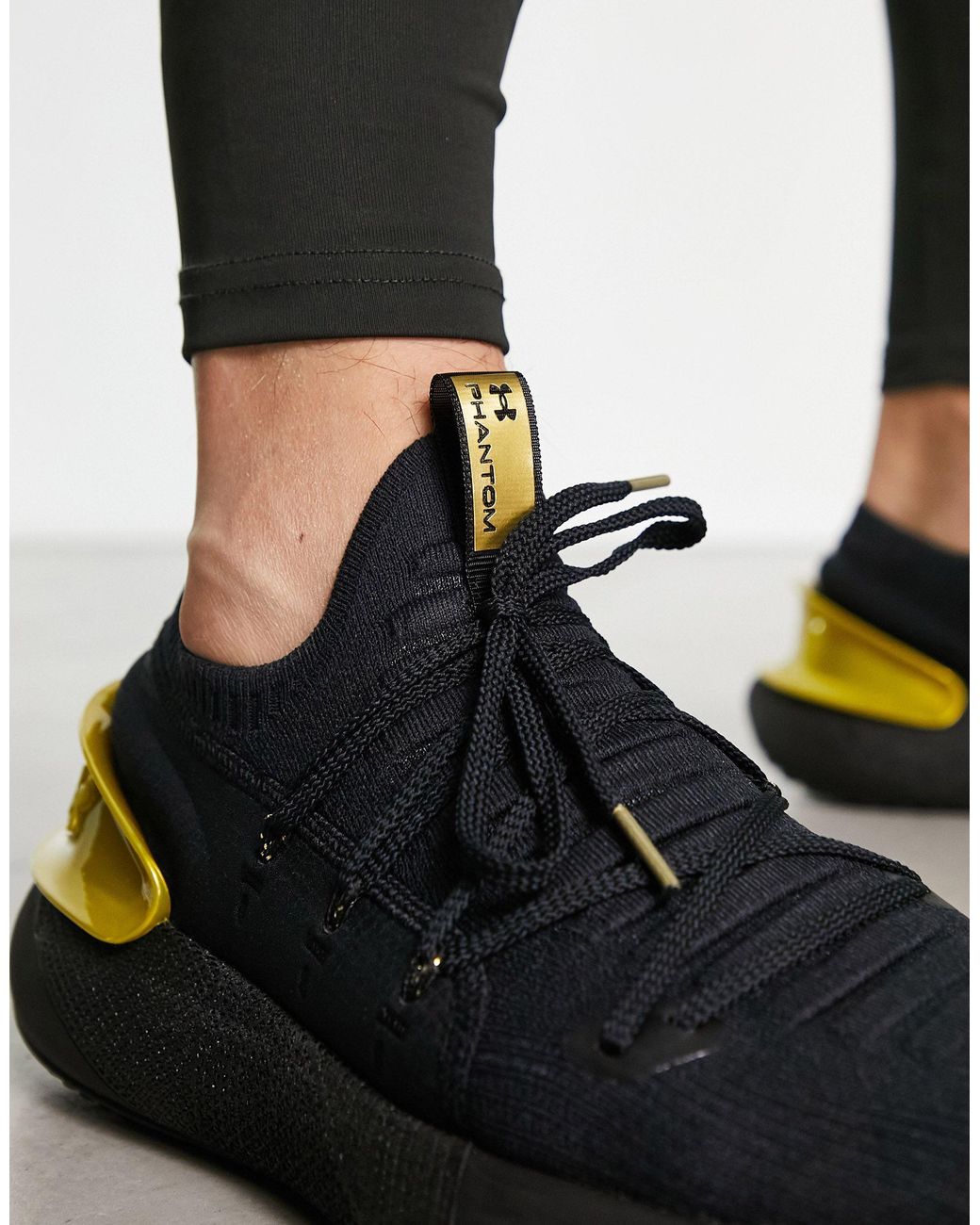 Under armour black and gold deals