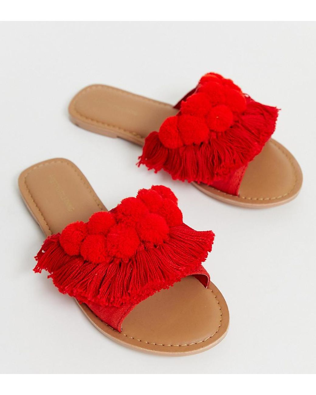 PrettyLittleThing Flat Sandals With Fringe And Pom Pom Detail in Red | Lyst