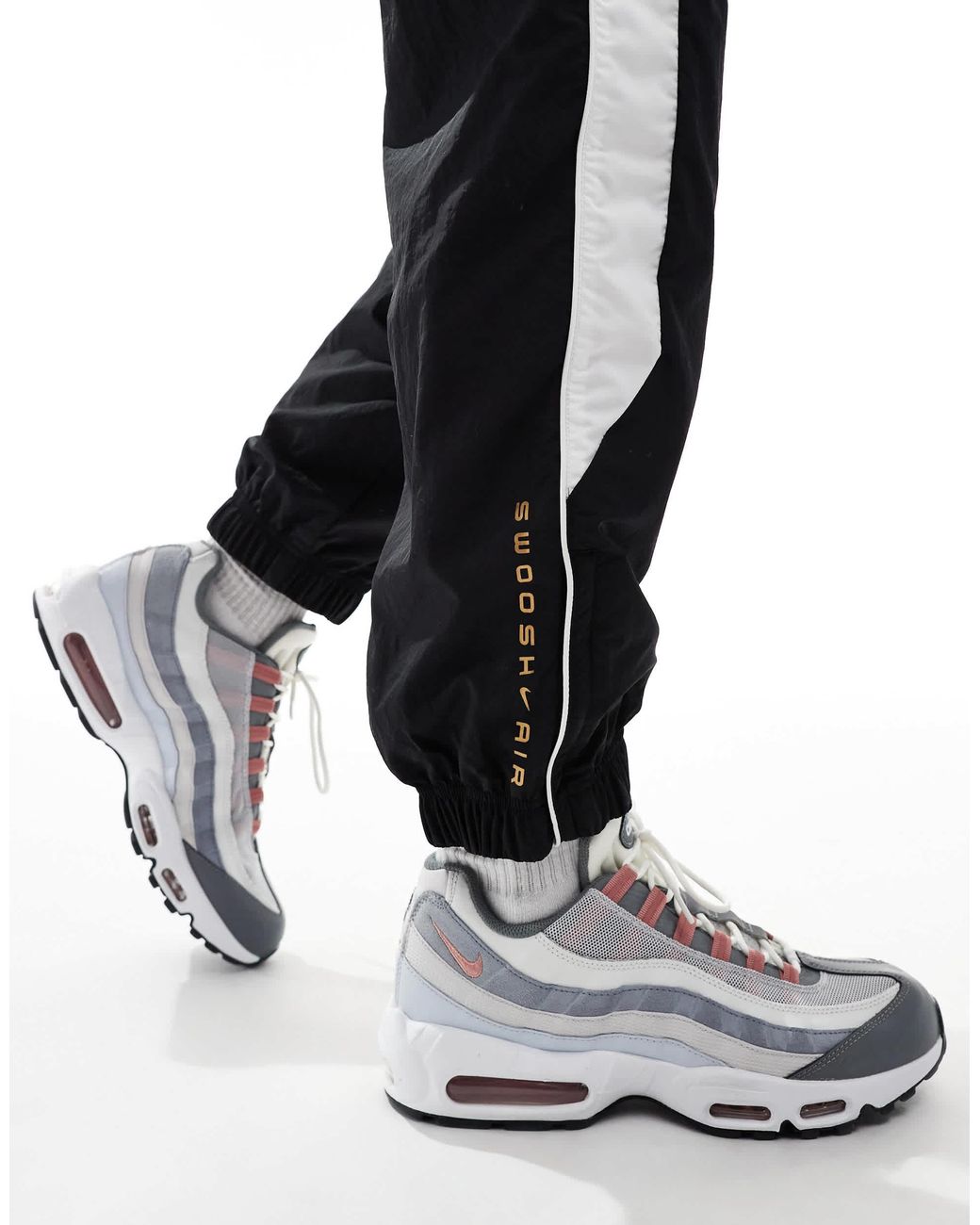 Nike swoosh joggers black and white hotsell