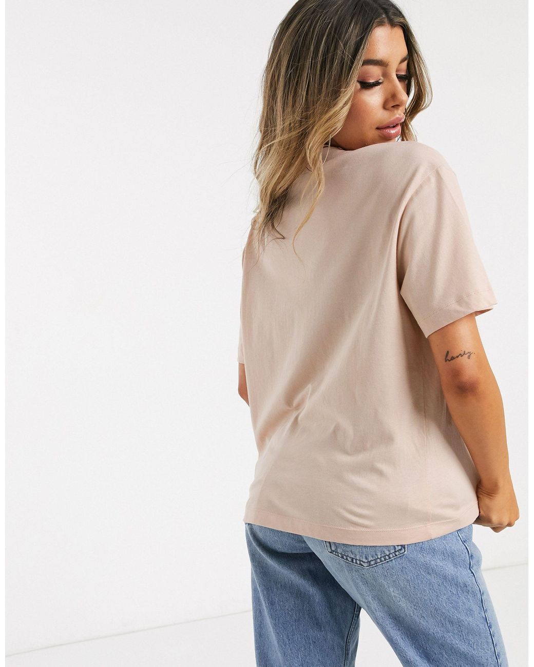 T-shirt oversize avec logo virgule centré Nike en coloris Neutre | Lyst