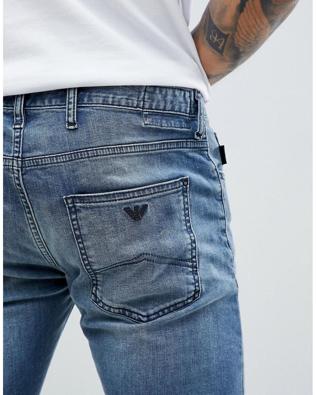 Emporio Armani J10 Extra Slim Light Wash Jeans in Blue for Men | Lyst UK