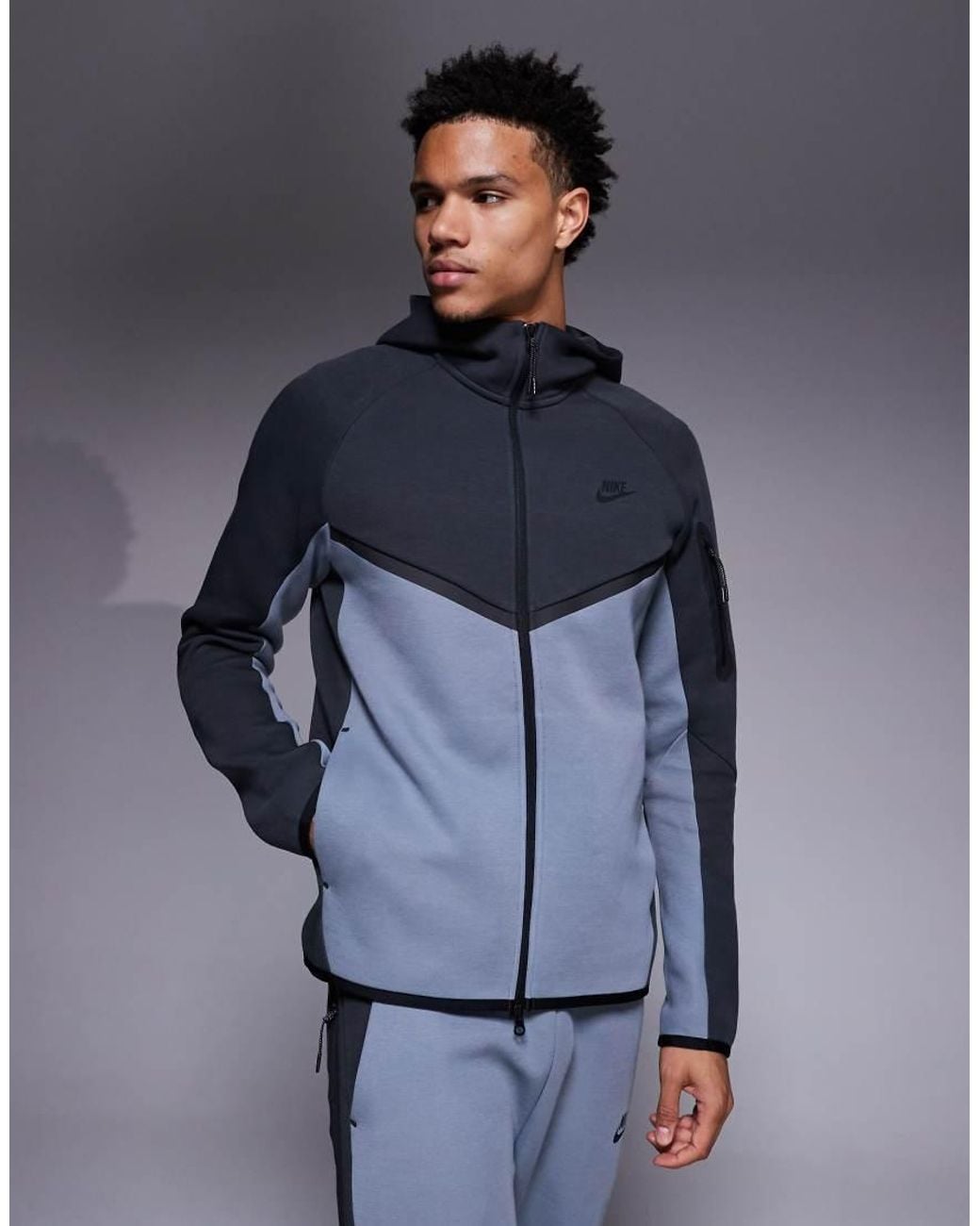 blue and grey nike tech