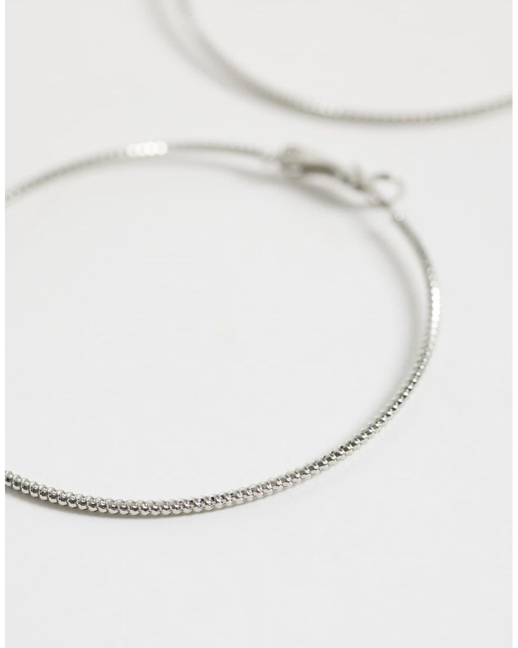 Reclaimed Vintage Metallic Large Y2K Skinny Hoop Earrings