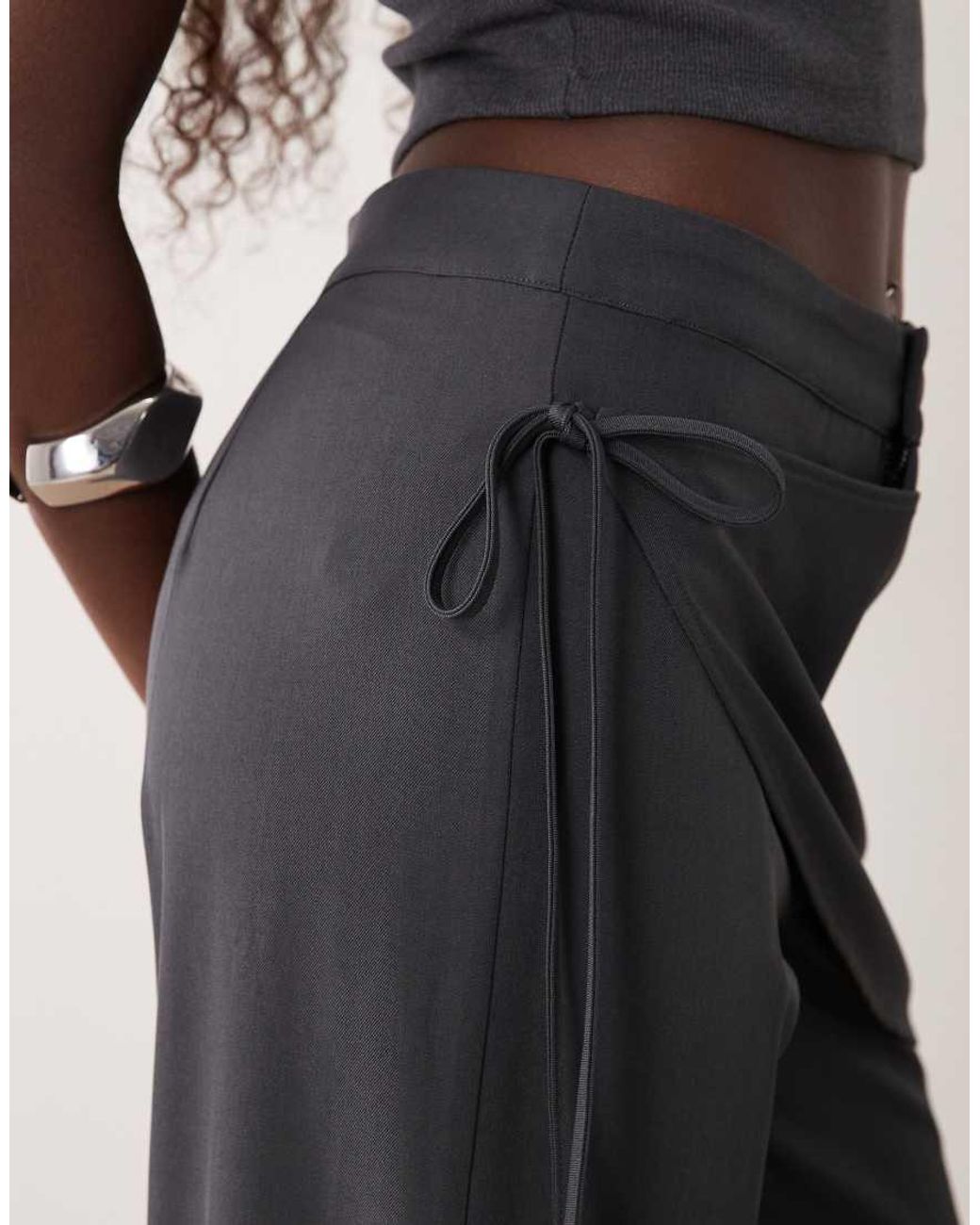 The Frolic Black Wrap Front Tie Straight Leg Trouser