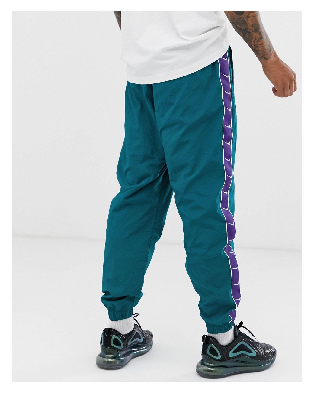 Nike Synthetic Logo Taping Sweatpants in Green for Men | Lyst