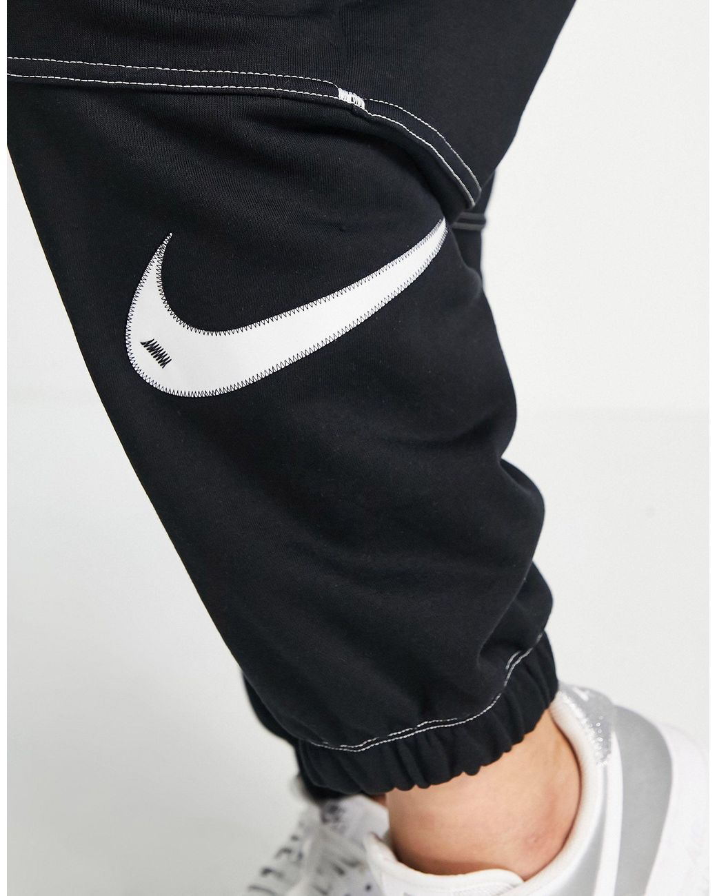 nike plus swoosh fleece pants