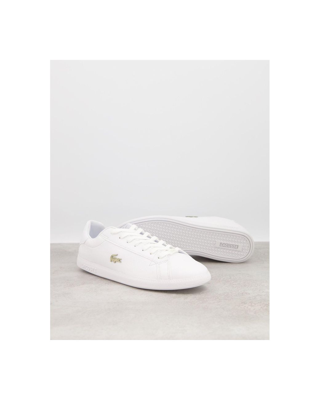 lacoste mens graduate trainers white dark blue