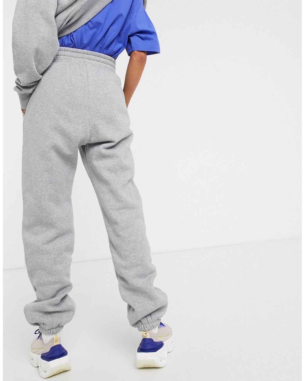 nike mini swoosh oversized gray sweatpants