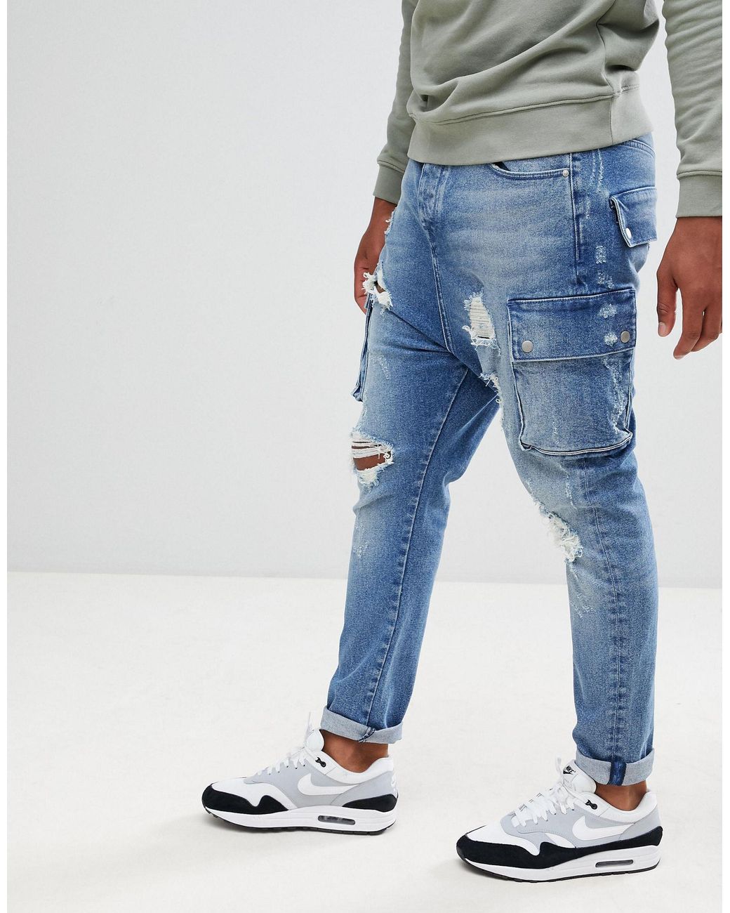 ASOS – Jeans mit tiefem Schritt, Rissen und Cargo-Taschen in Blau für  Herren | Lyst DE