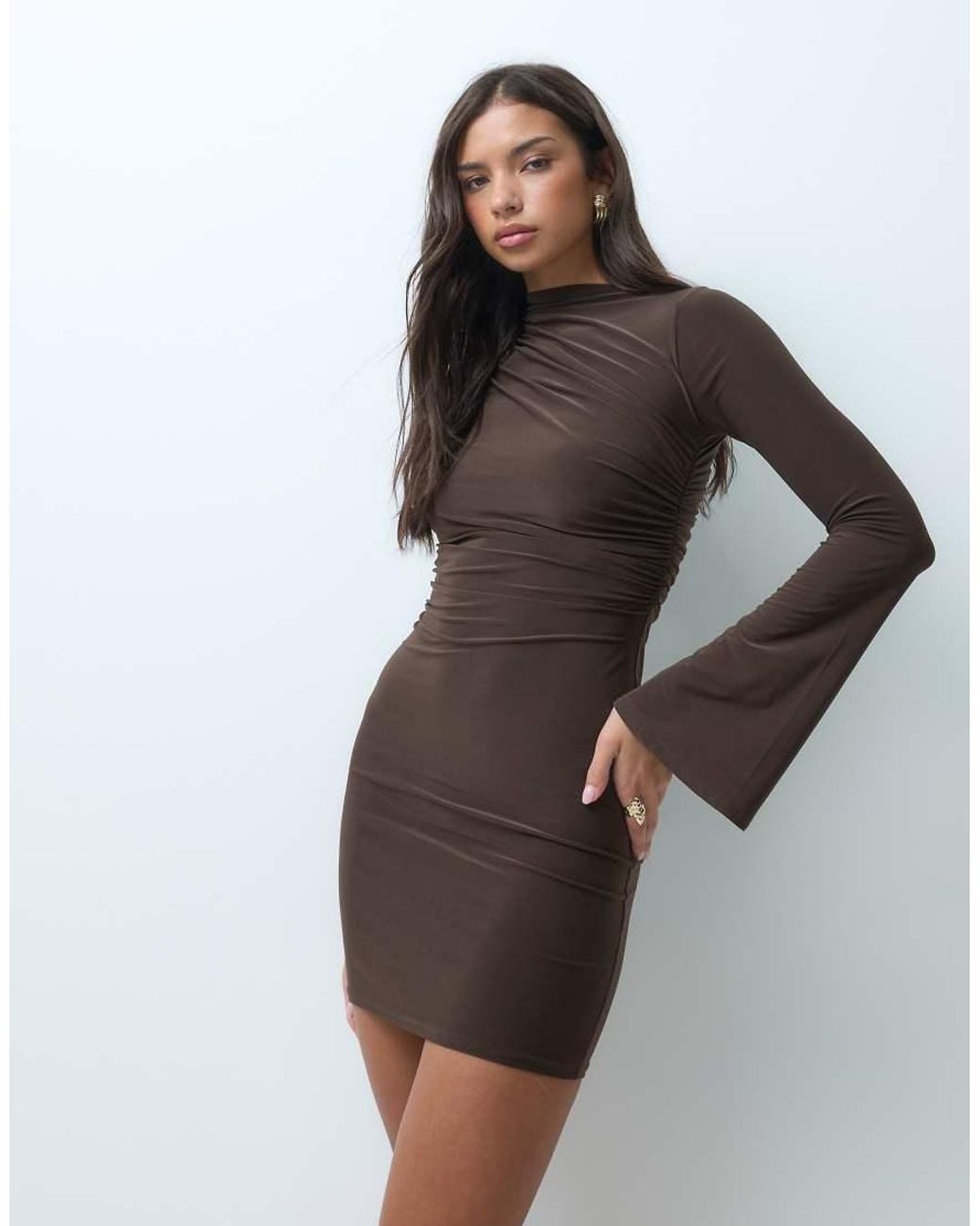Kaiia Brown Exclusive Double Sculpted Slinky Asymmetric Shoulder Flare Sleeve Mini Dress
