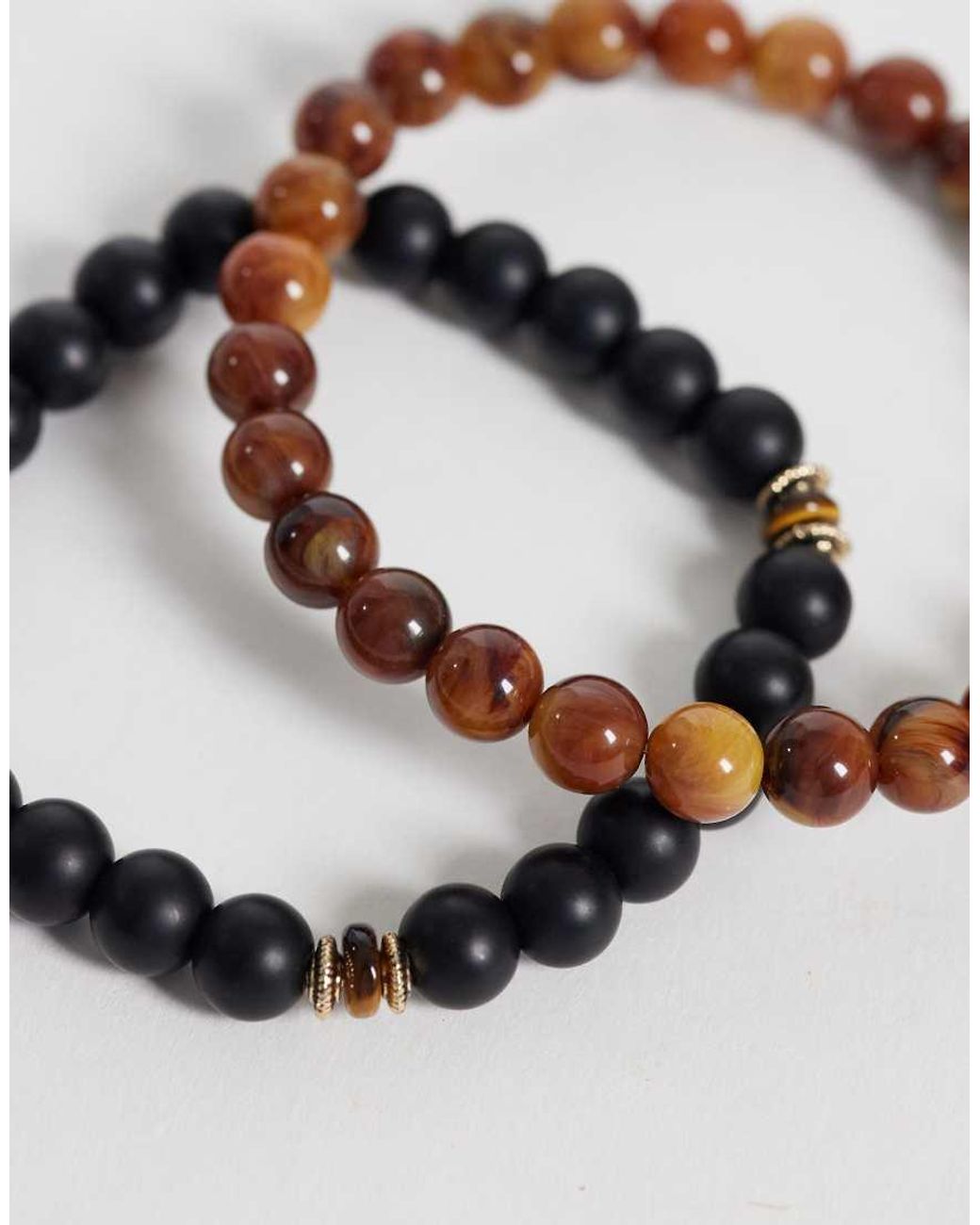 ASOS White 4 Pack Faux Tigers Eye Beaded Chain And Braided Faux Leather Bracelet for men