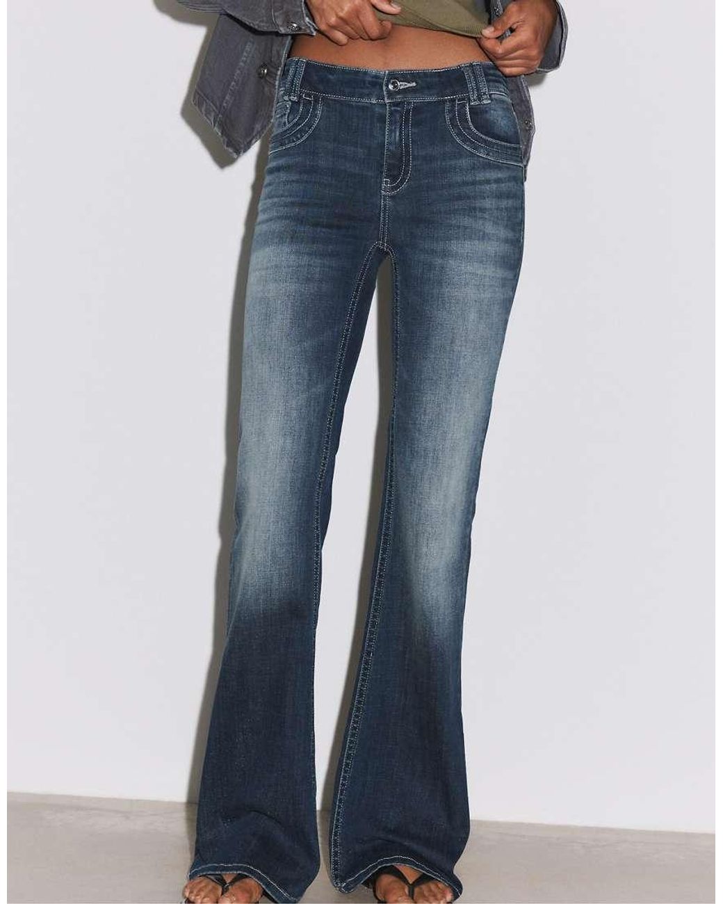 Stradivarius Blue Embroidered Pocket Bell Bottom Jeans