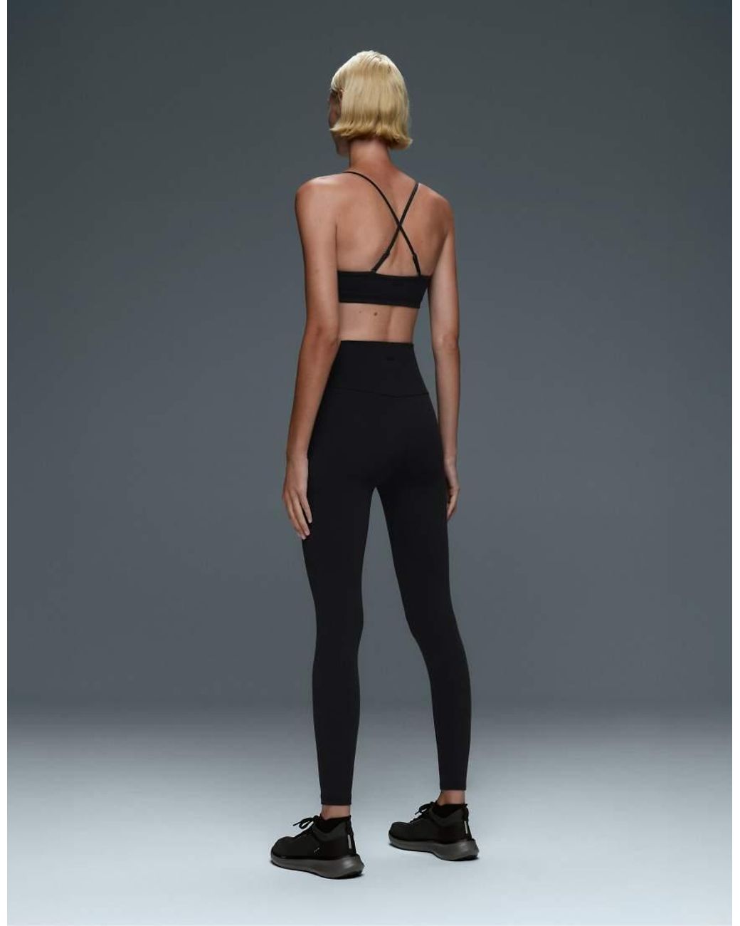 Oysho Black Comfortlux Light-support Sports Bra With Crossover Straps