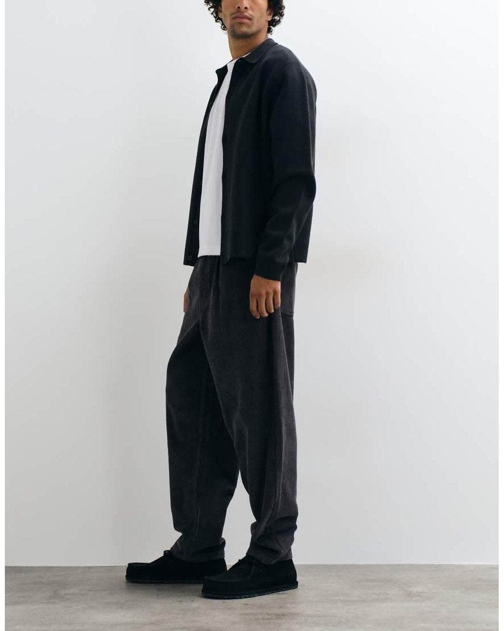ASOS Black Relaxed Tapered Corduroy Trousers for men