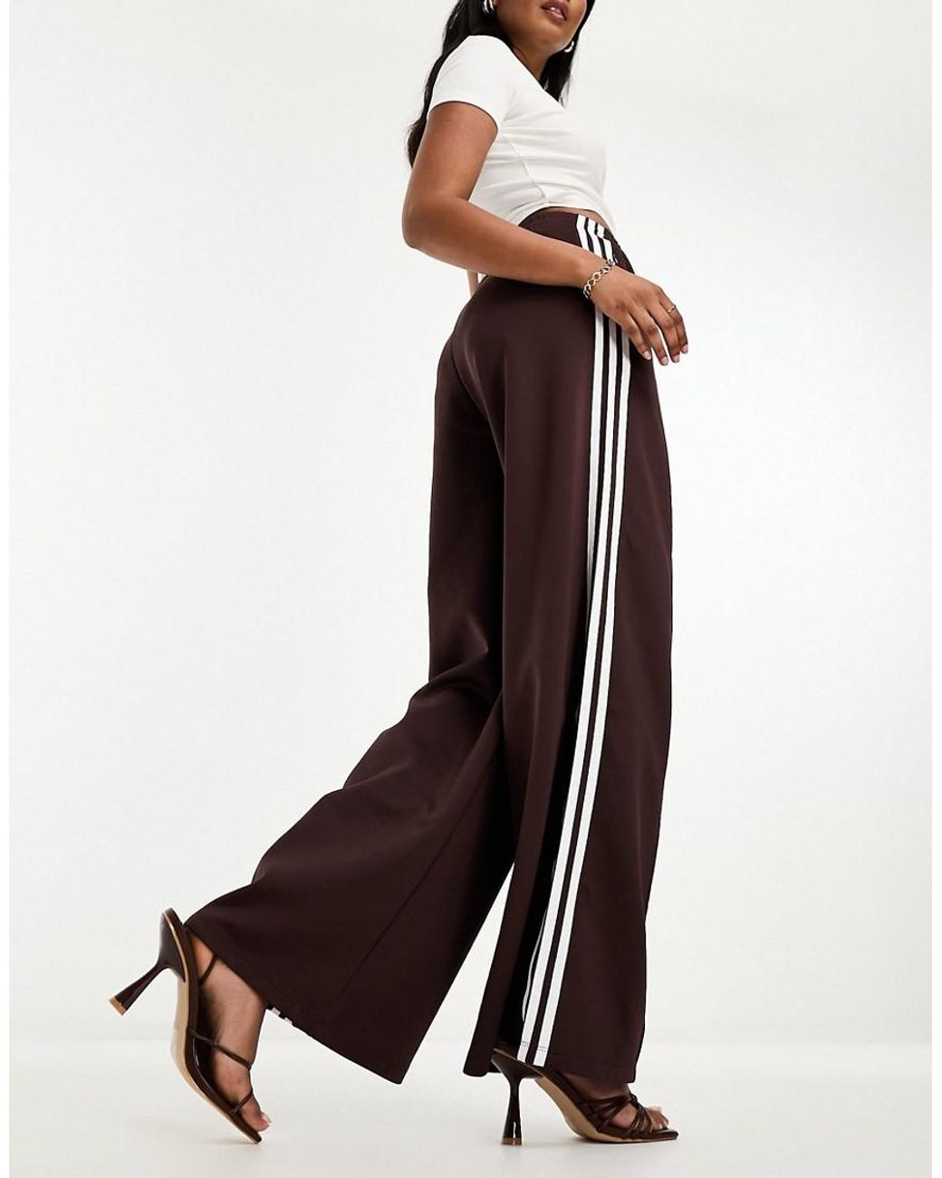 Pantaloni adidas marroni 2025