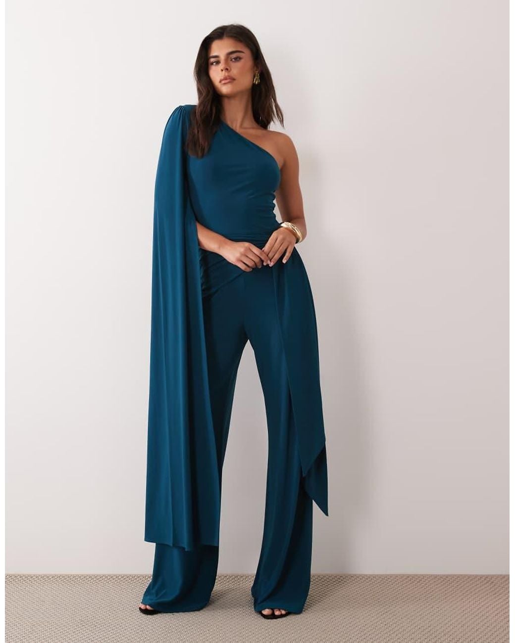 ASOS Blue Asymmetric One Shoulder Jumpsuit With Sash Cape Detail And Tie
