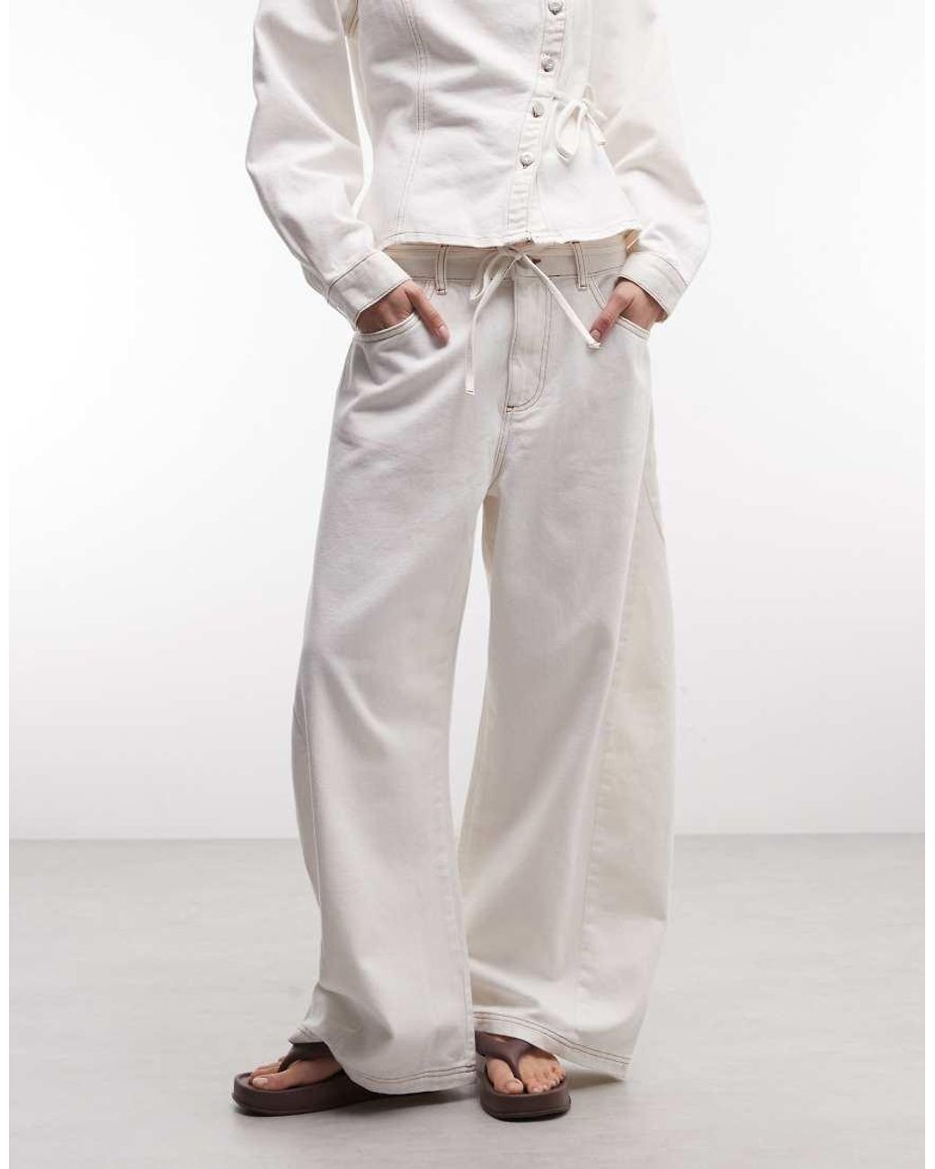 Reclaimed Vintage White Denim baggy Wide Leg Jeans With Tie Detail