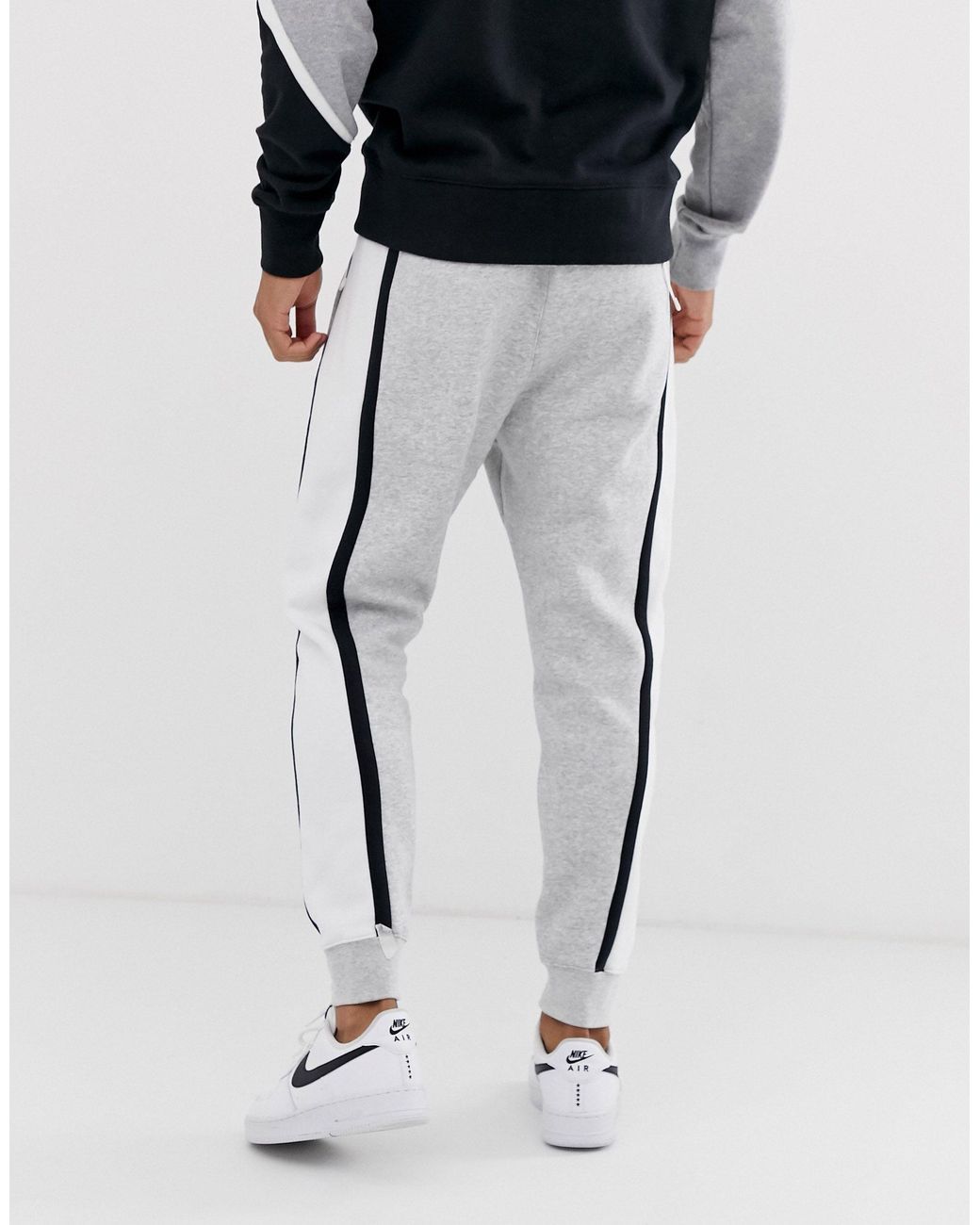 Nike black sweatpants with white stripe 2025