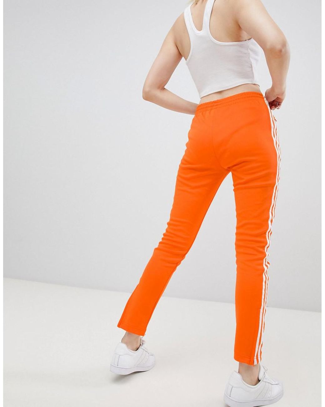Pantalon cigarette trois bandes adidas Originals en coloris Orange | Lyst