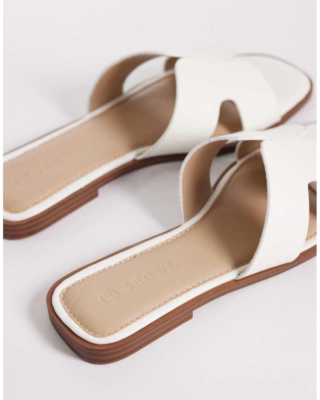 SEQWL White Storke Flat Sandals