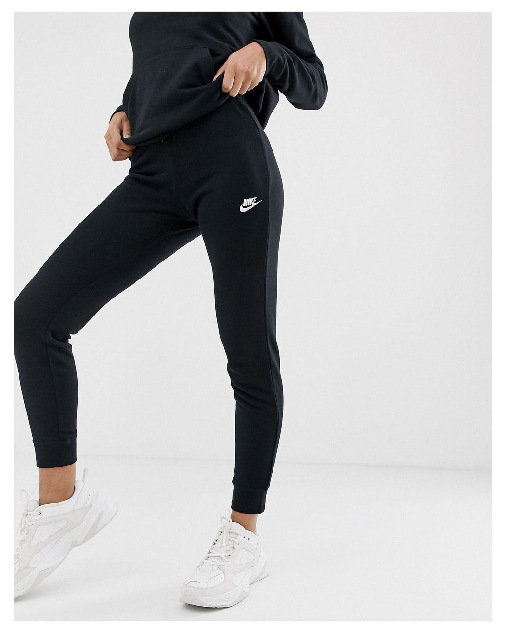 nike black essentials slim joggers women's