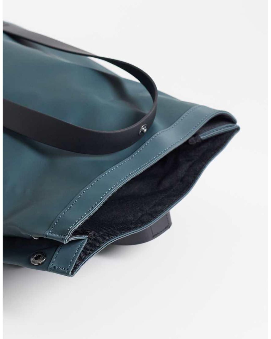 Rains Blue 12780 2 Way Waterproof Mini Tote/backpack for men