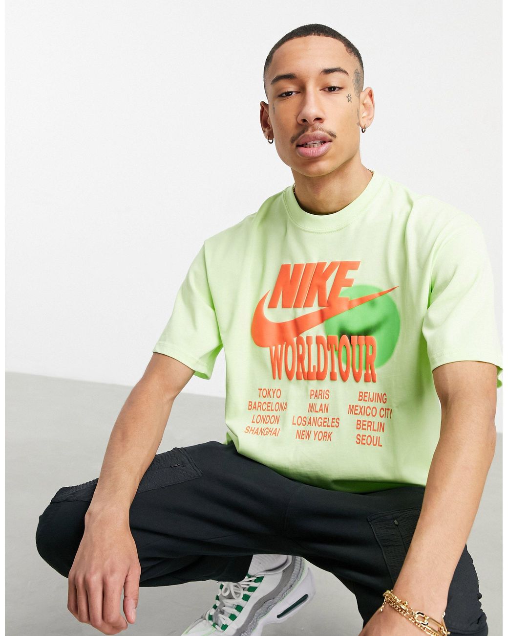Nike World Tour Pack Graphic Oversized T-shirt in Green for Men | Lyst  Australia