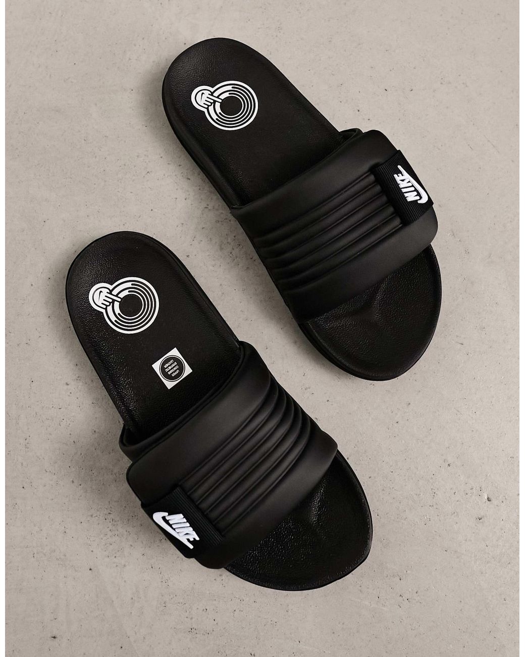 black sliders nike