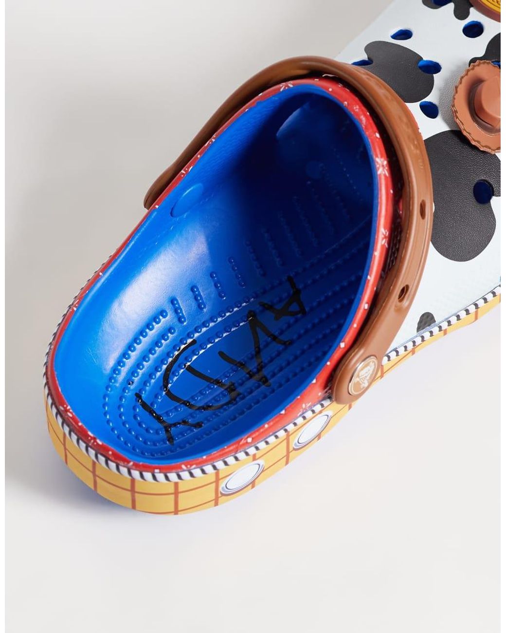 CROCSTM Unisex Disney Toy Story Woody Classic Clogs-blue
