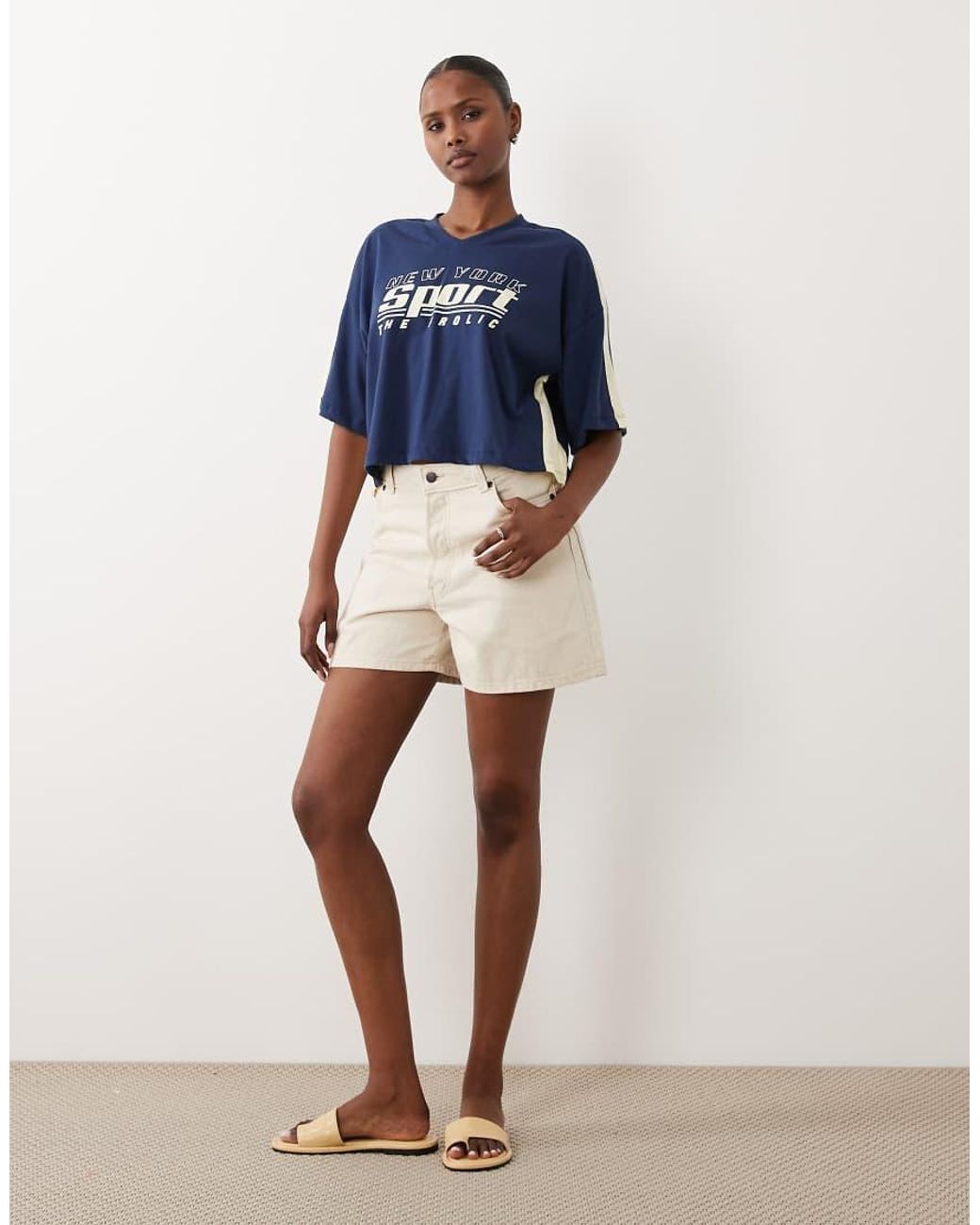 The Frolic Blue Exclusive V-neck Graphic Front Contrast Yellow Trim Cropped Football Jersey