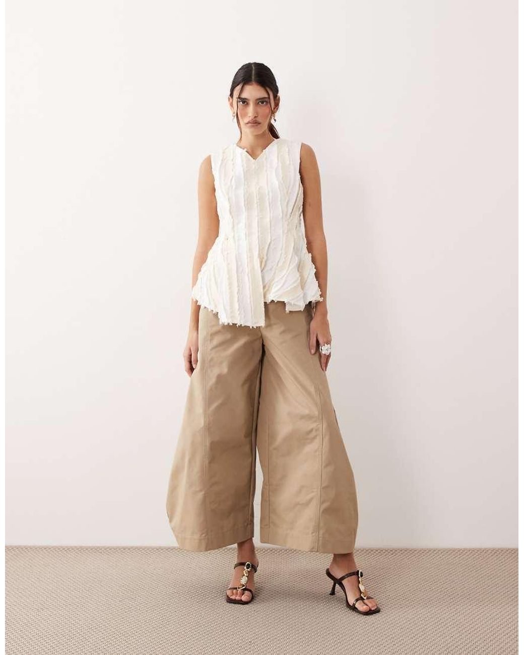 ARRANGE Natural Sleeveless Raw Edge Pleated Top