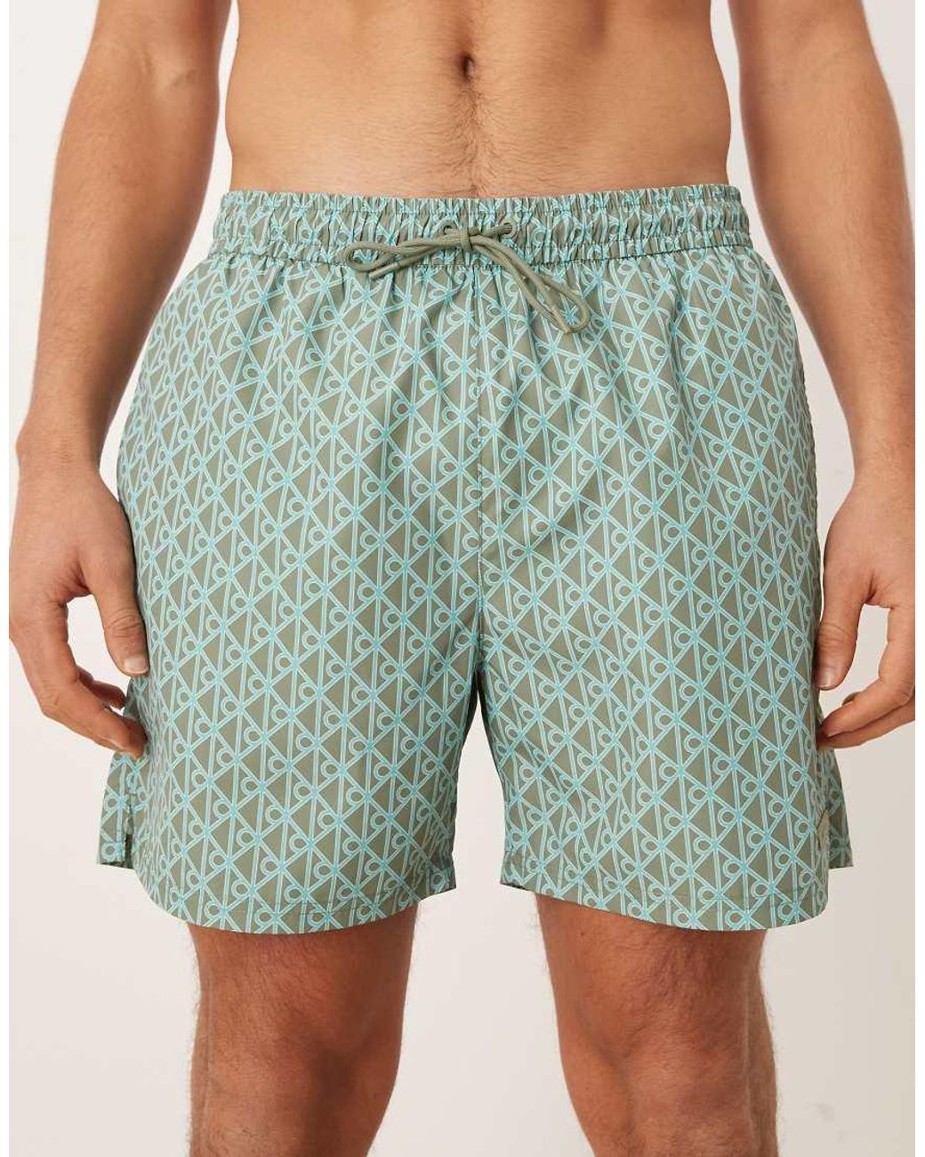 Calvin Klein Blue Monogram Print Drawstring Swim Shorts for men