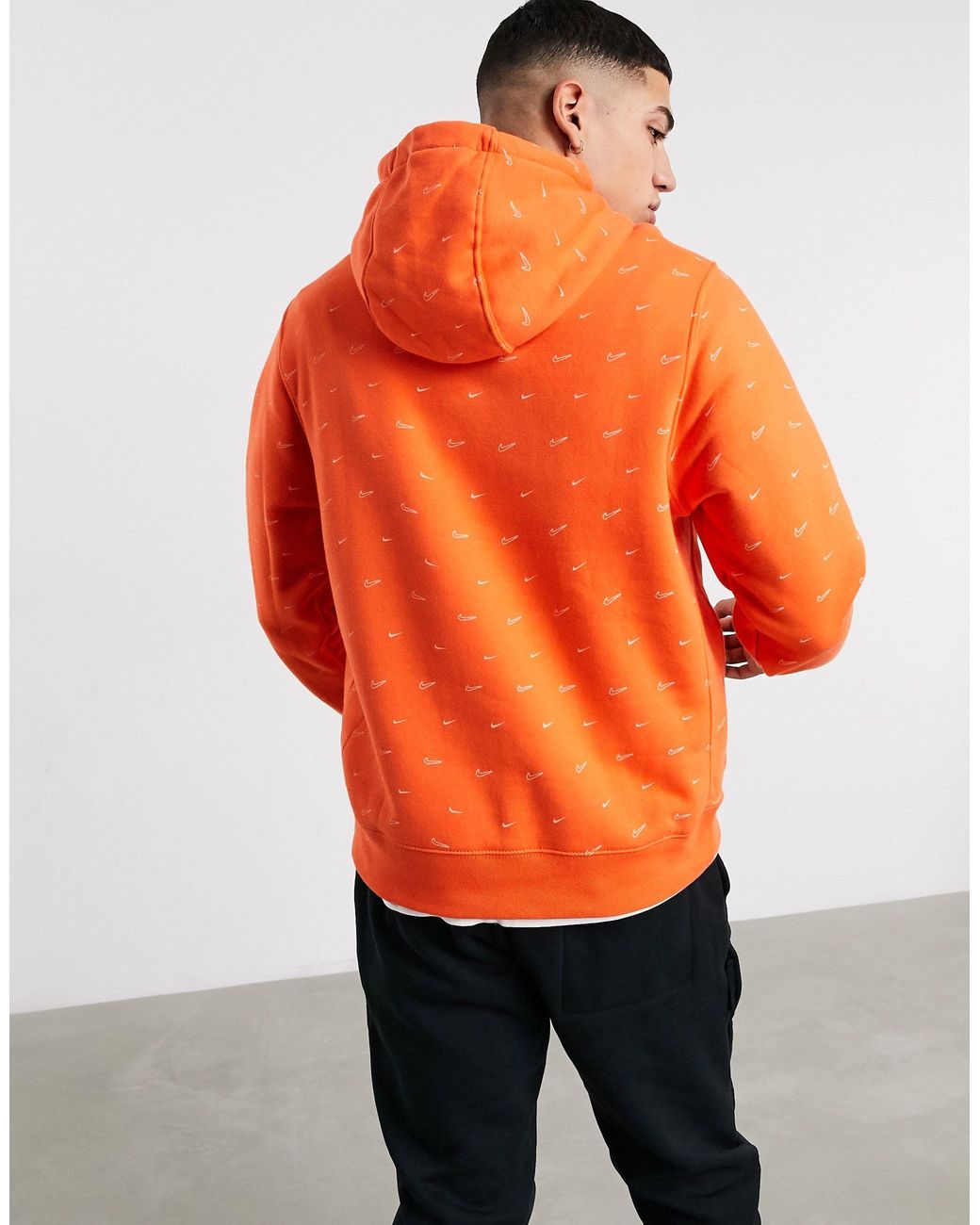 Nike All-over Swoosh Print Hoodie in Orange for Men | Lyst