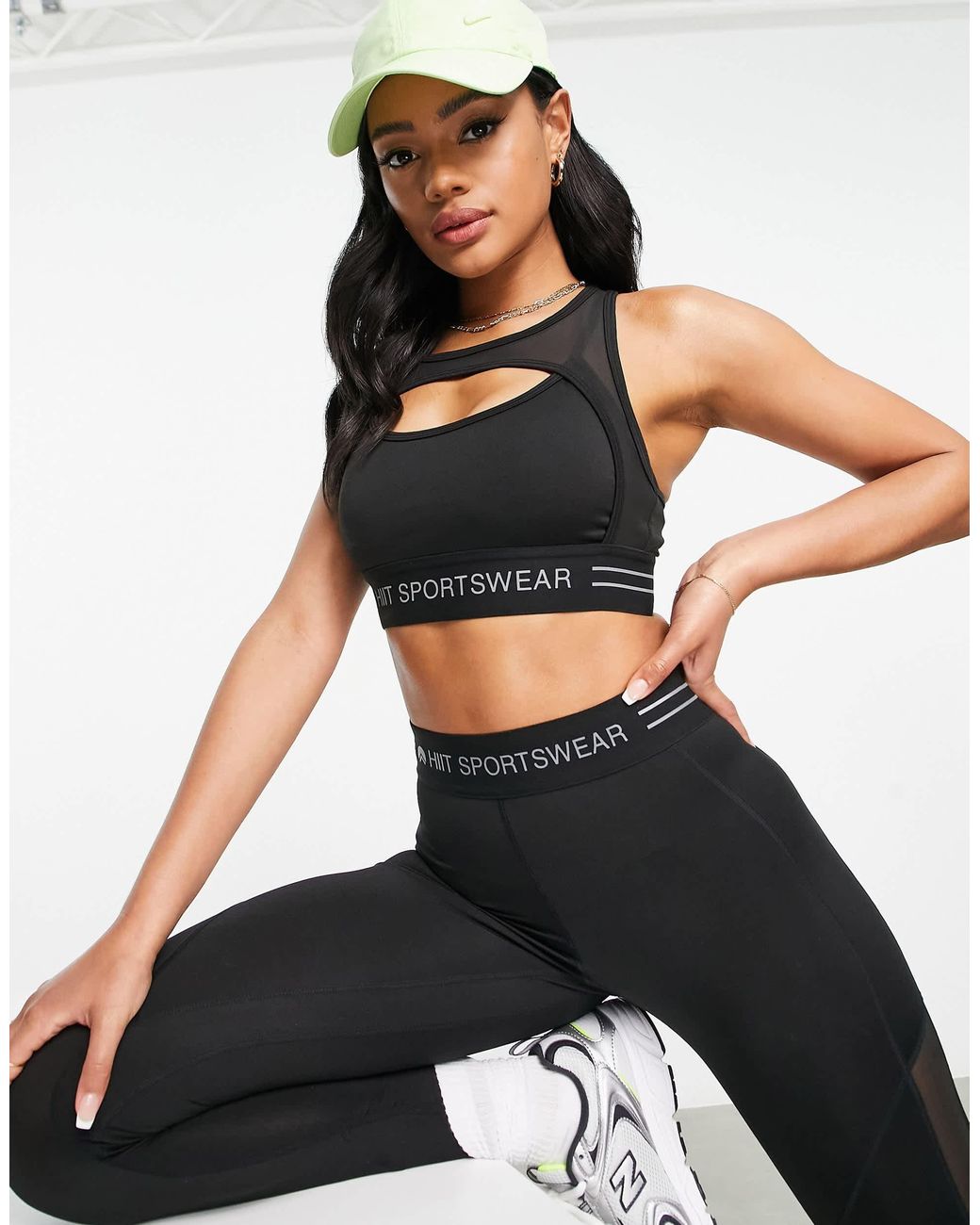 HIIT Reflective Logo Sports Bra in Black Lyst