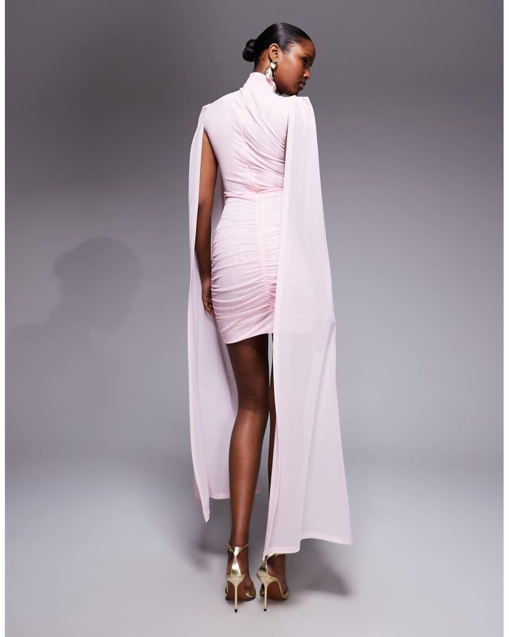 Ruched & Ready Pink Sculpting Mock Neck Mesh Cape And Twisted Skirt Detailing Mini Dress