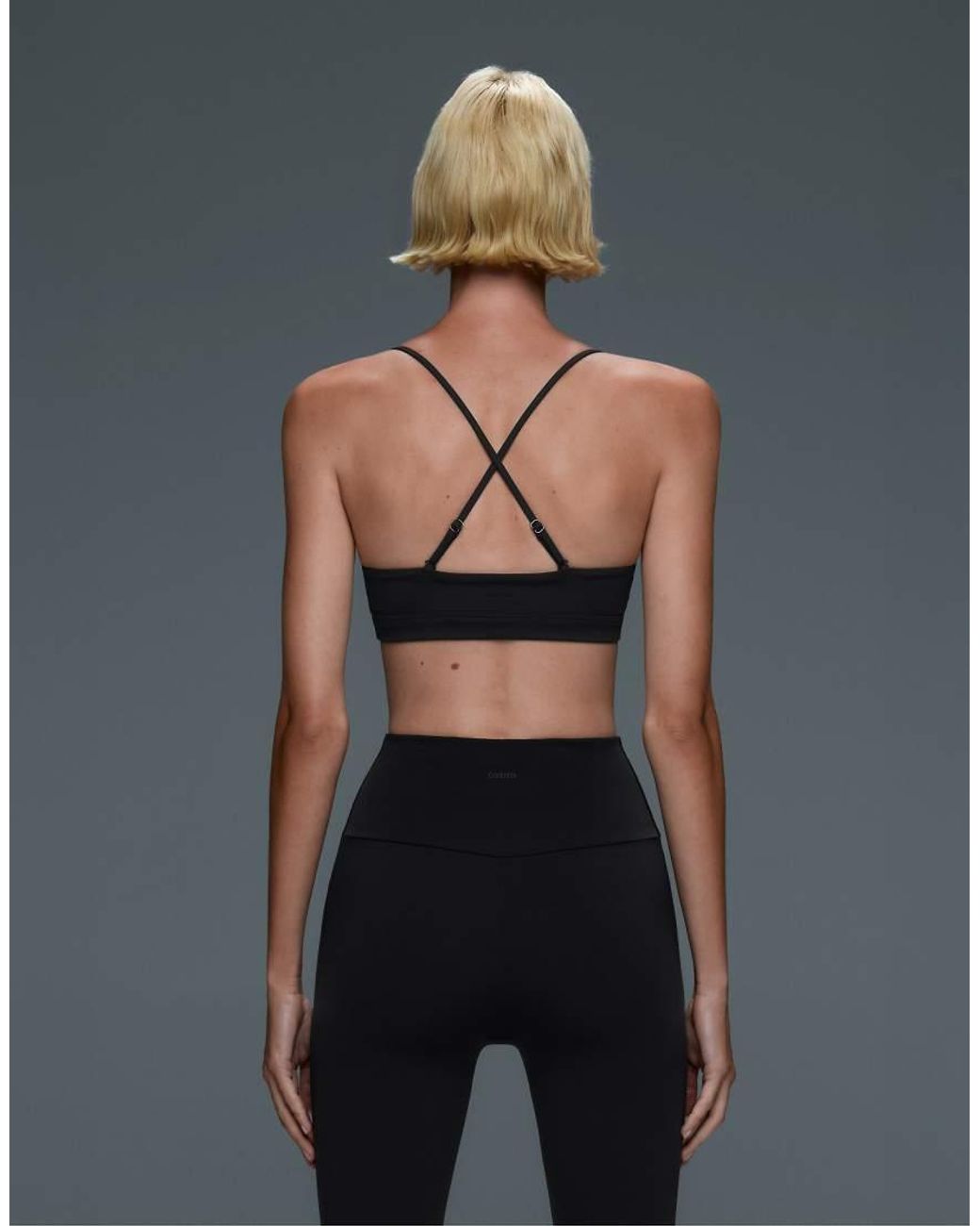 Oysho Black Comfortlux Light-support Sports Bra With Crossover Straps
