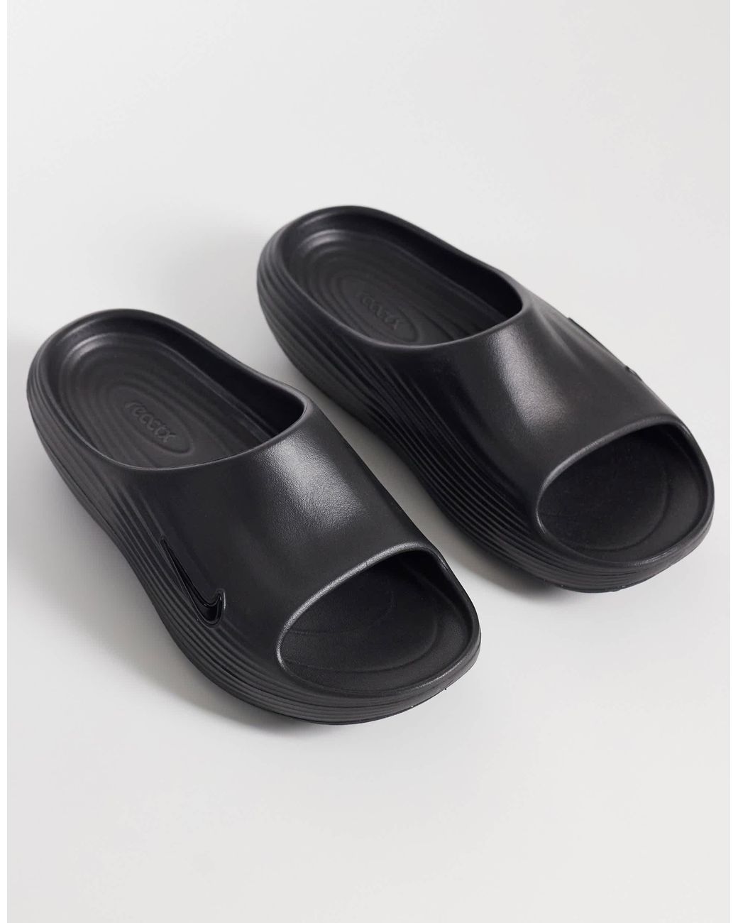 Reactx - claquettes Nike pour homme en coloris Black