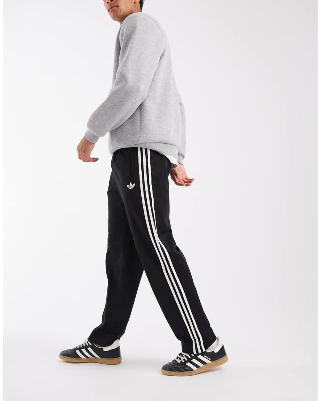 Adidas Originals Black Firebird Trackpants for men