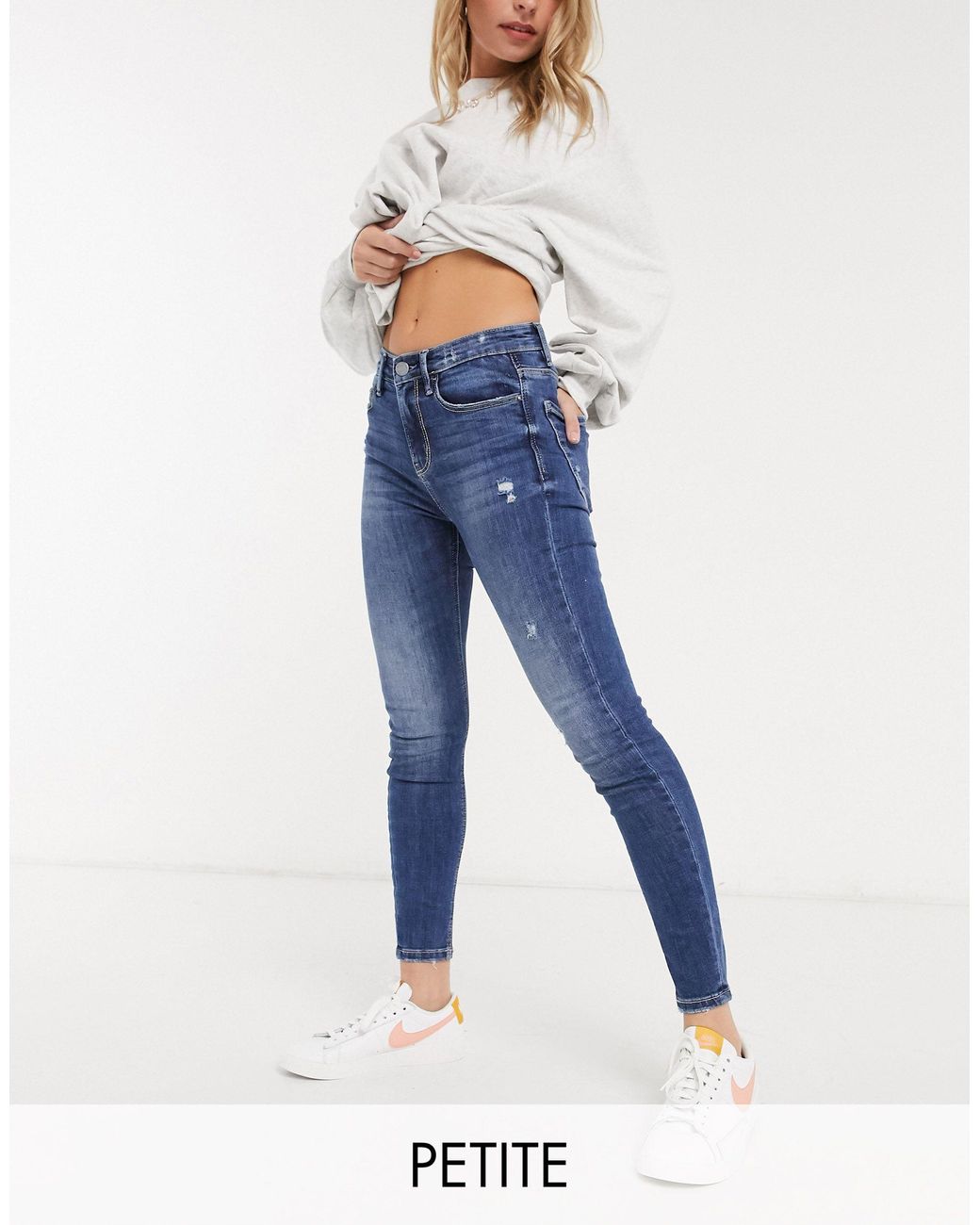 Stradivarius Petite – enge jeans mit hohem bund und dunkler waschung in  Blau | Lyst DE