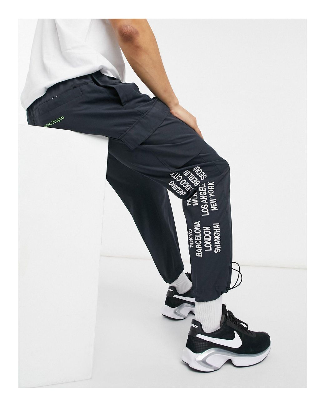 Nike – world tour pack – gewebte cargo-jogginghose mit grafik und bündchen  in Schwarz für Herren | Lyst DE