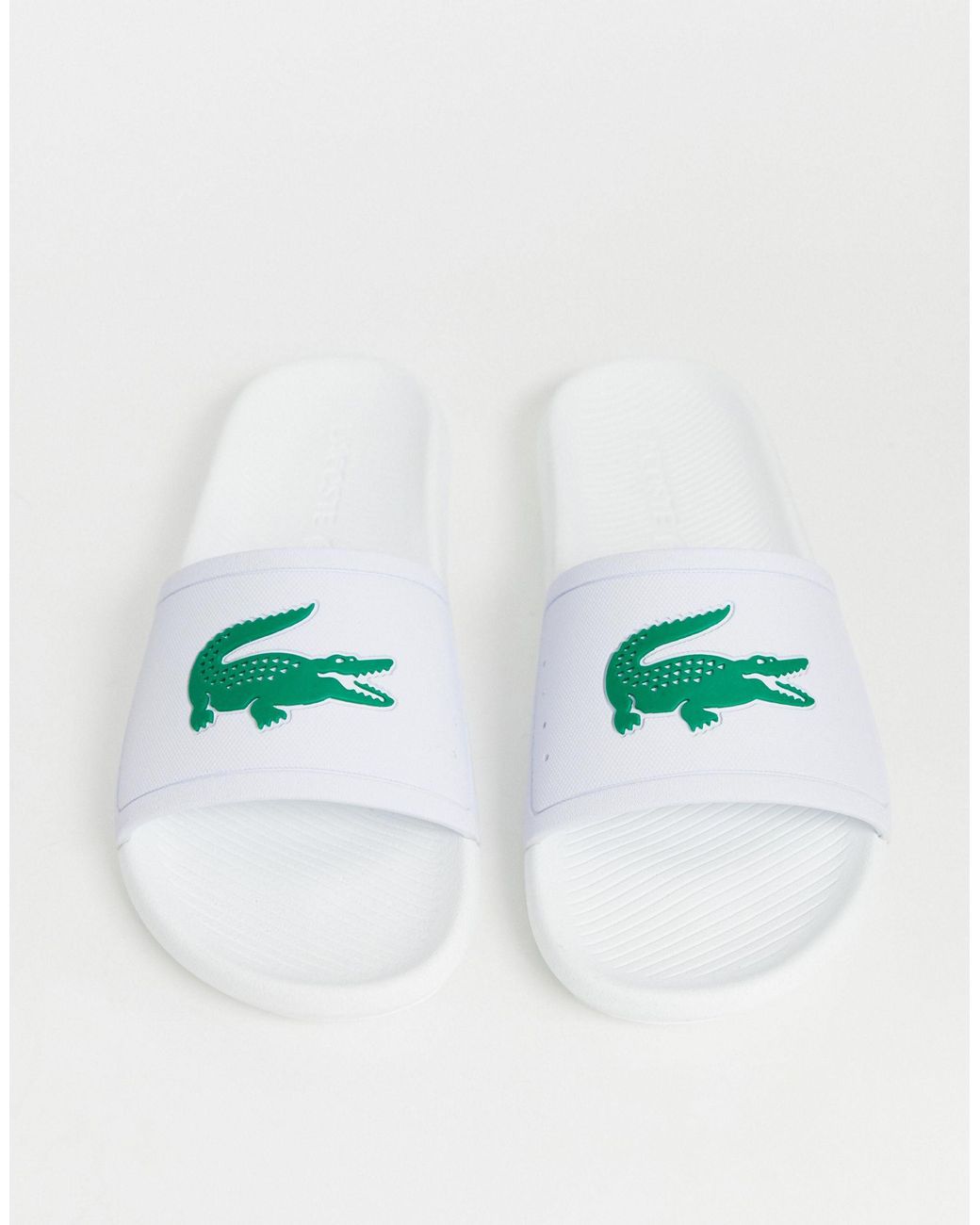 green lacoste sliders