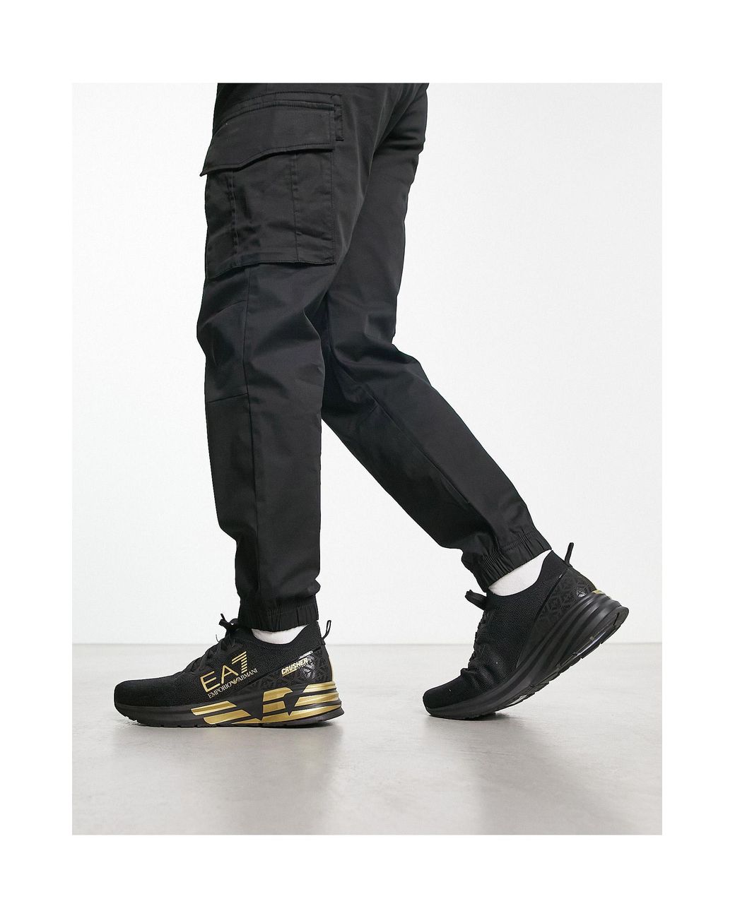 https://cdna.lystit.com/1040/1300/n/photos/asos/a736c362/ea7-Black-Emporio-Armani-Crusher-Knitted-Sneakers.jpeg