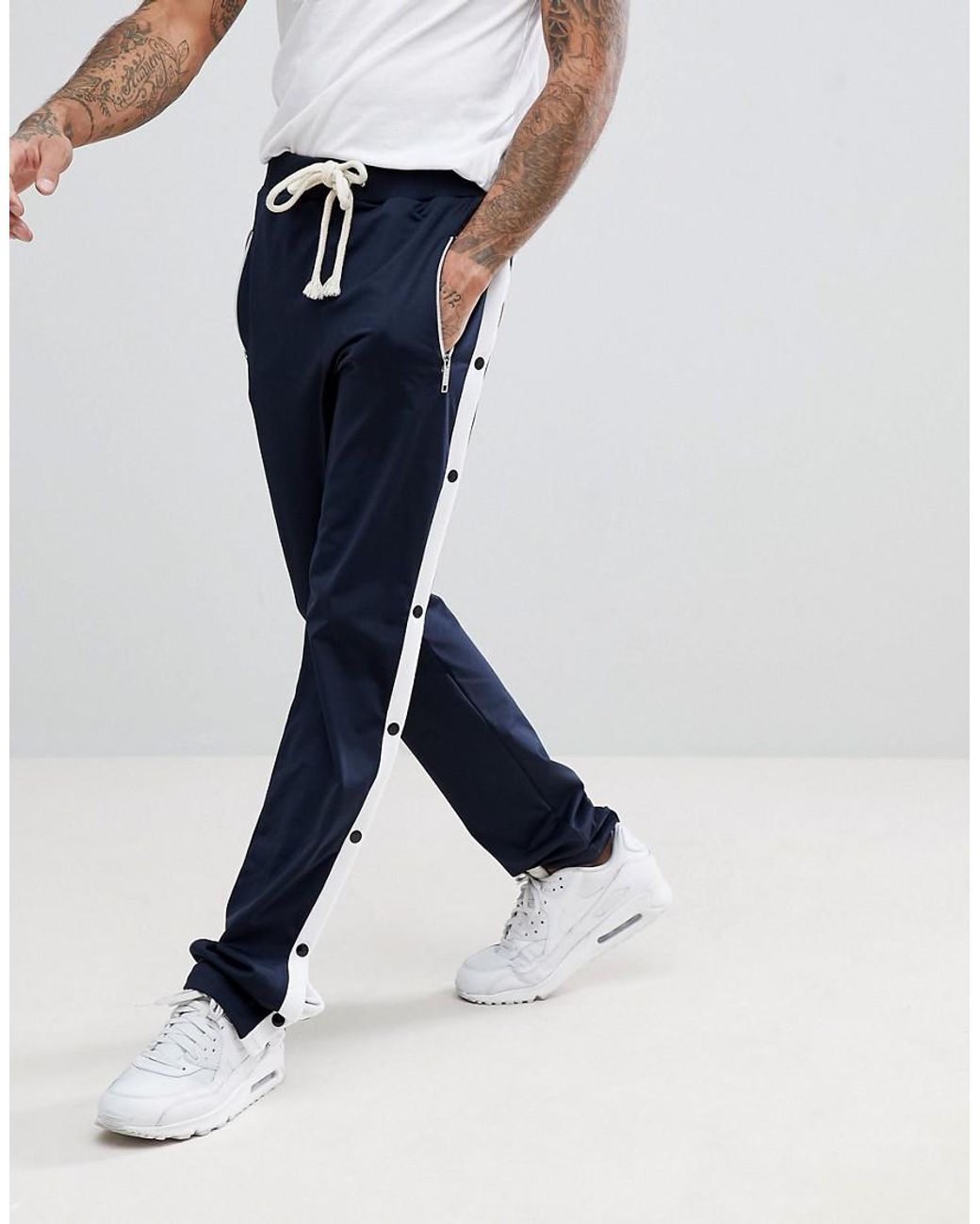 Pantalon de jogging coupe ajustée avec boutons pression Boohoo pour homme  en coloris Bleu | Lyst